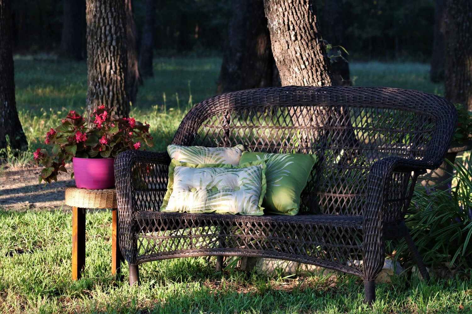 A seating area doesn’t have to be extensive; personalize with favorite pillows and flowers.